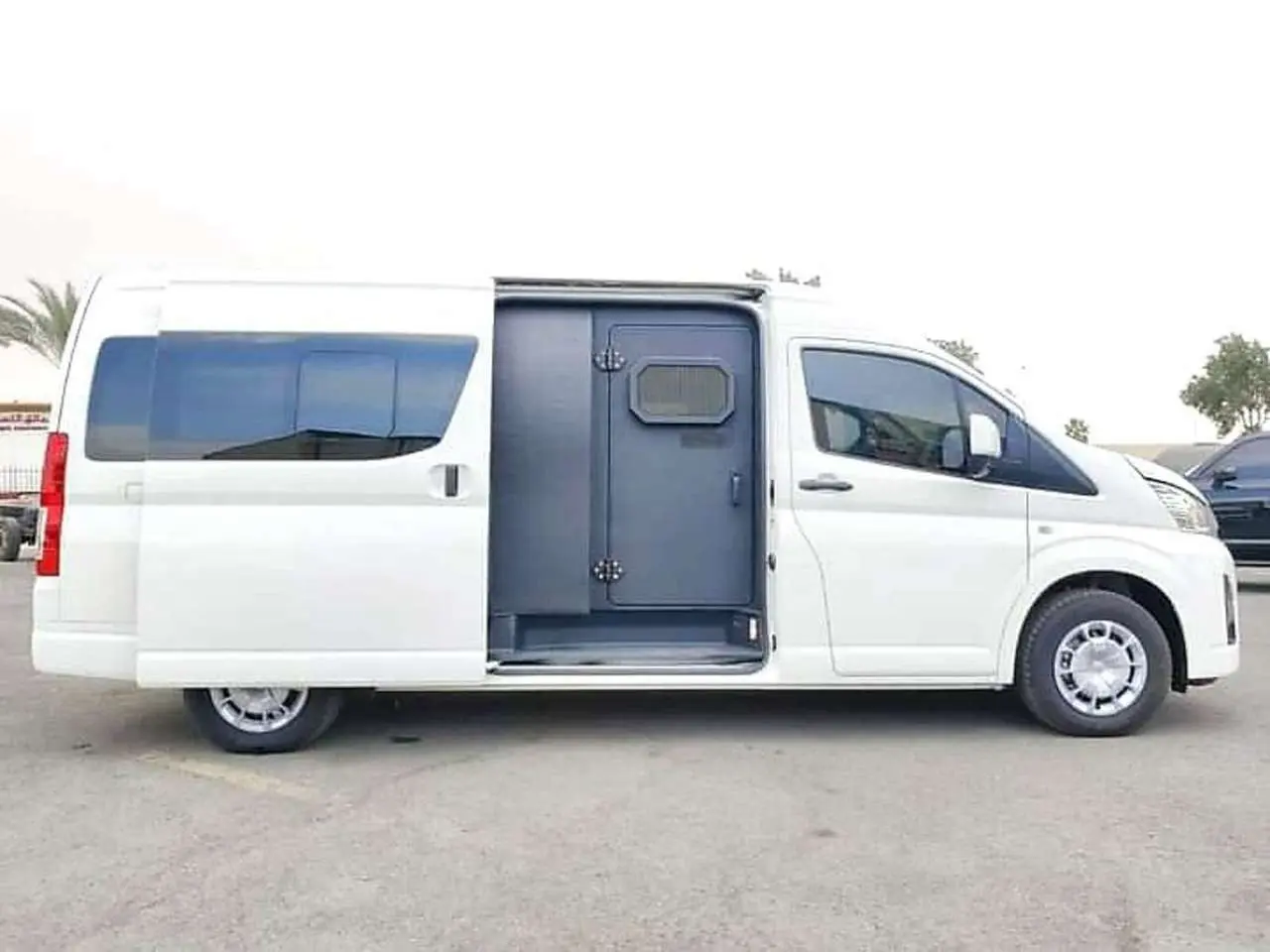 Bullet proof armoured Toyota Hiace bus for hire in Lagos with ToTrip Car Rental Services