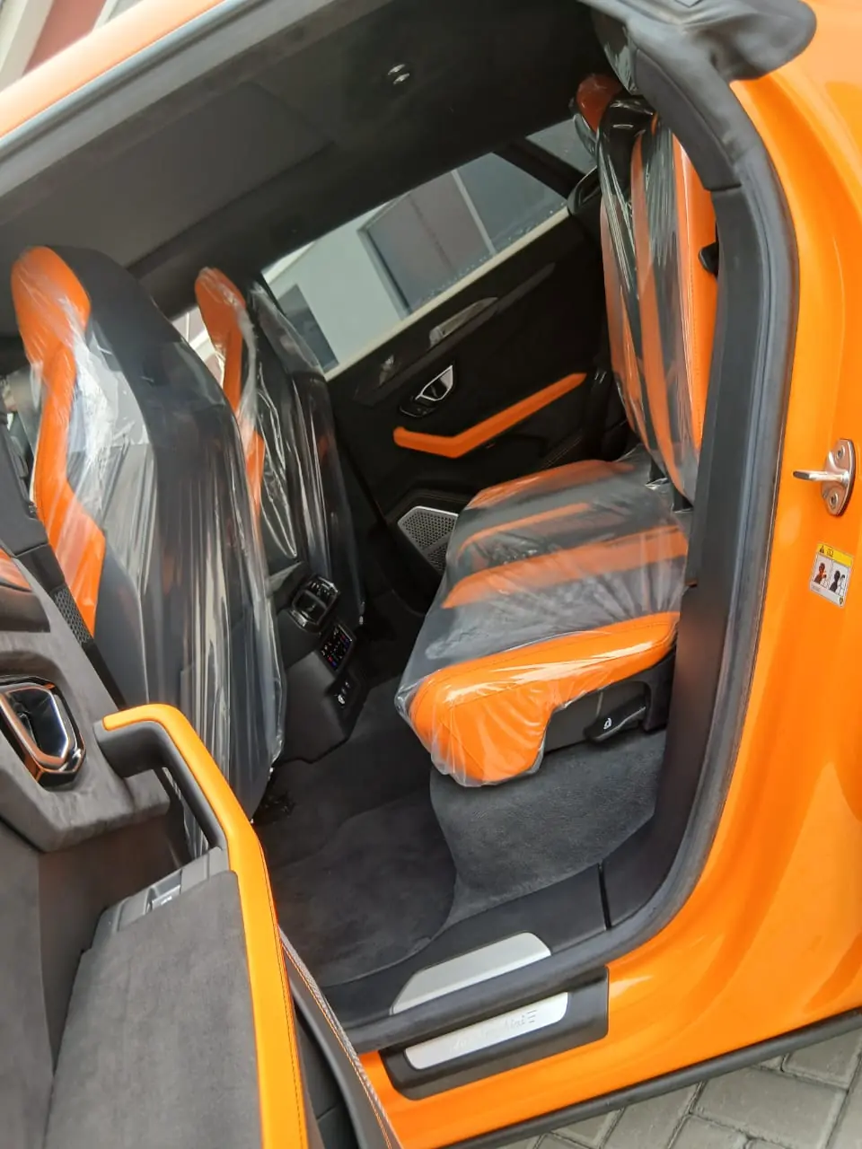 Lamborghini Urus orange rear seats, ToTrip Lagos